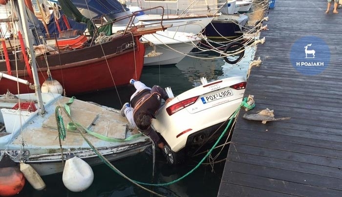 Ρόδος: Νεαροί τουρίστες "προσγείωσαν" αυτοκίνητο μέσα σε ψαρόβαρκες! (φωτογραφίες)